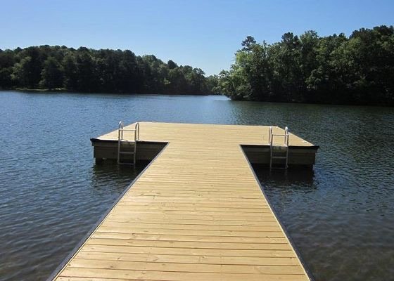 Wood pier and swim dock built by Williamson Boat Docks