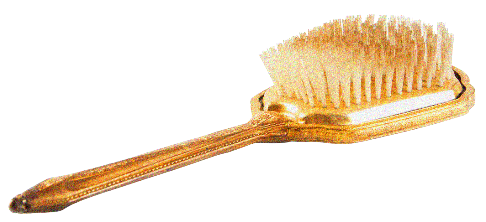A gold toothbrush with white bristles on a black background.