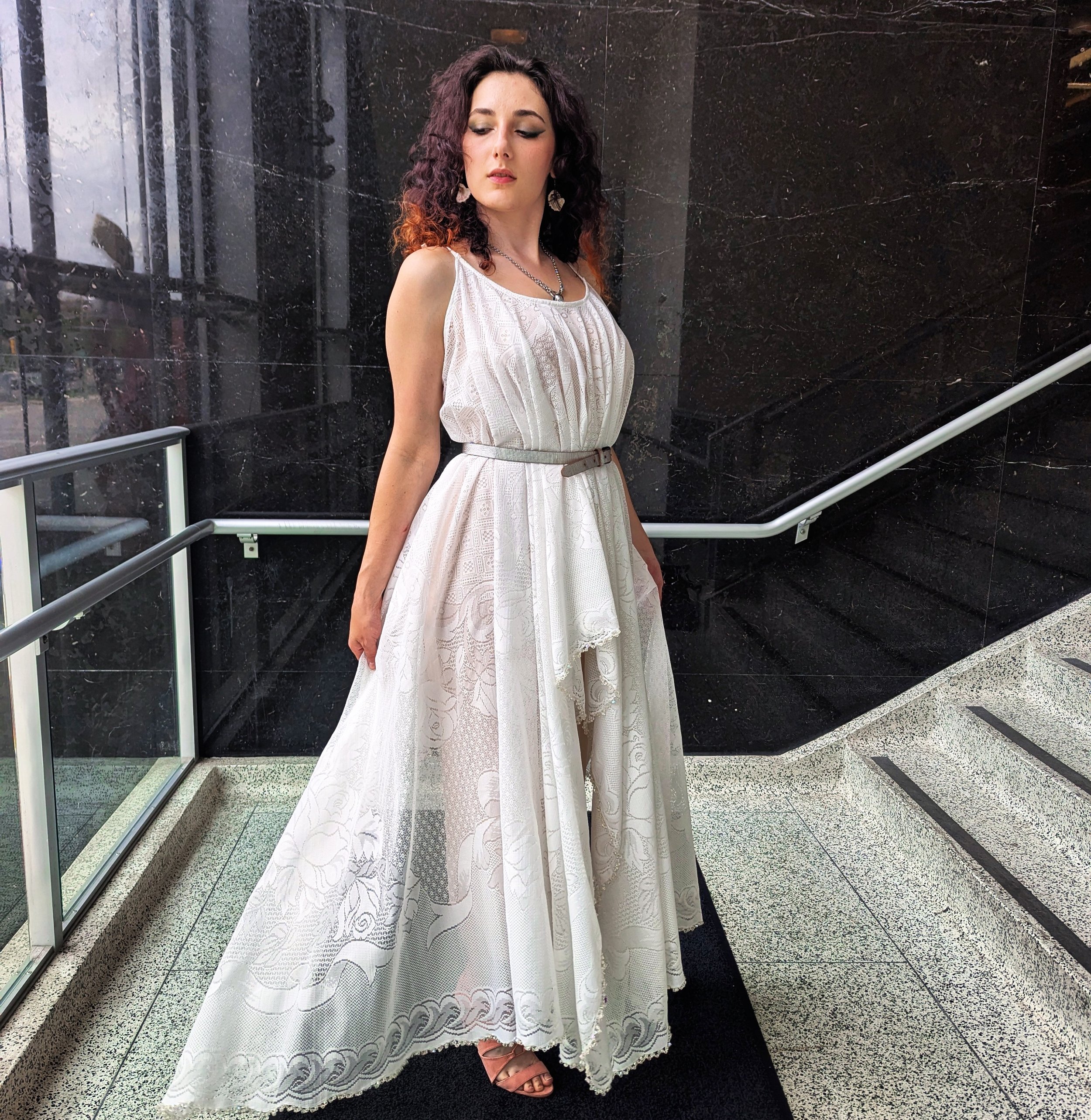 Lace dress I made and designed. The bottom trim has hand stitched beading.