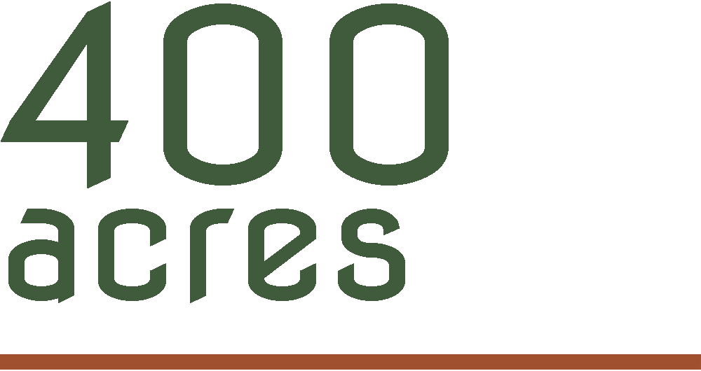 Digital graphic with large green text reading '400 acres' and a thin brown line at the bottom.