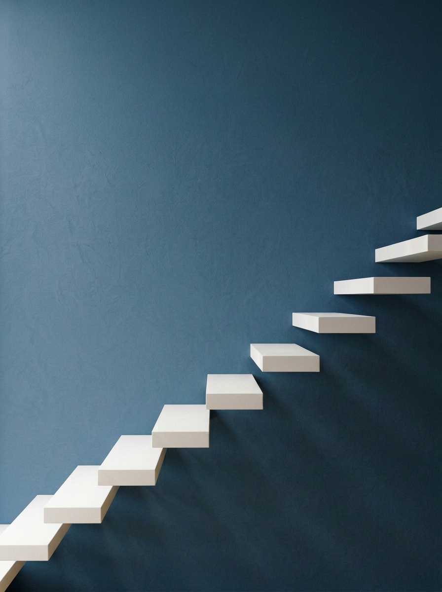 white modern staircase set against a blue wall