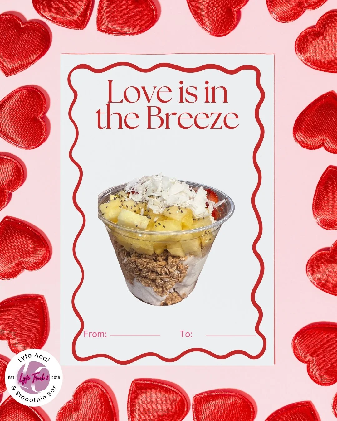 Valentine's Day-themed card with the phrase 'Love is in the Breeze' at the top. The center features a clear cup filled with layered granola, yogurt, sliced pineapple, strawberries, shredded coconut, and chia seeds. The background has pink with red sa