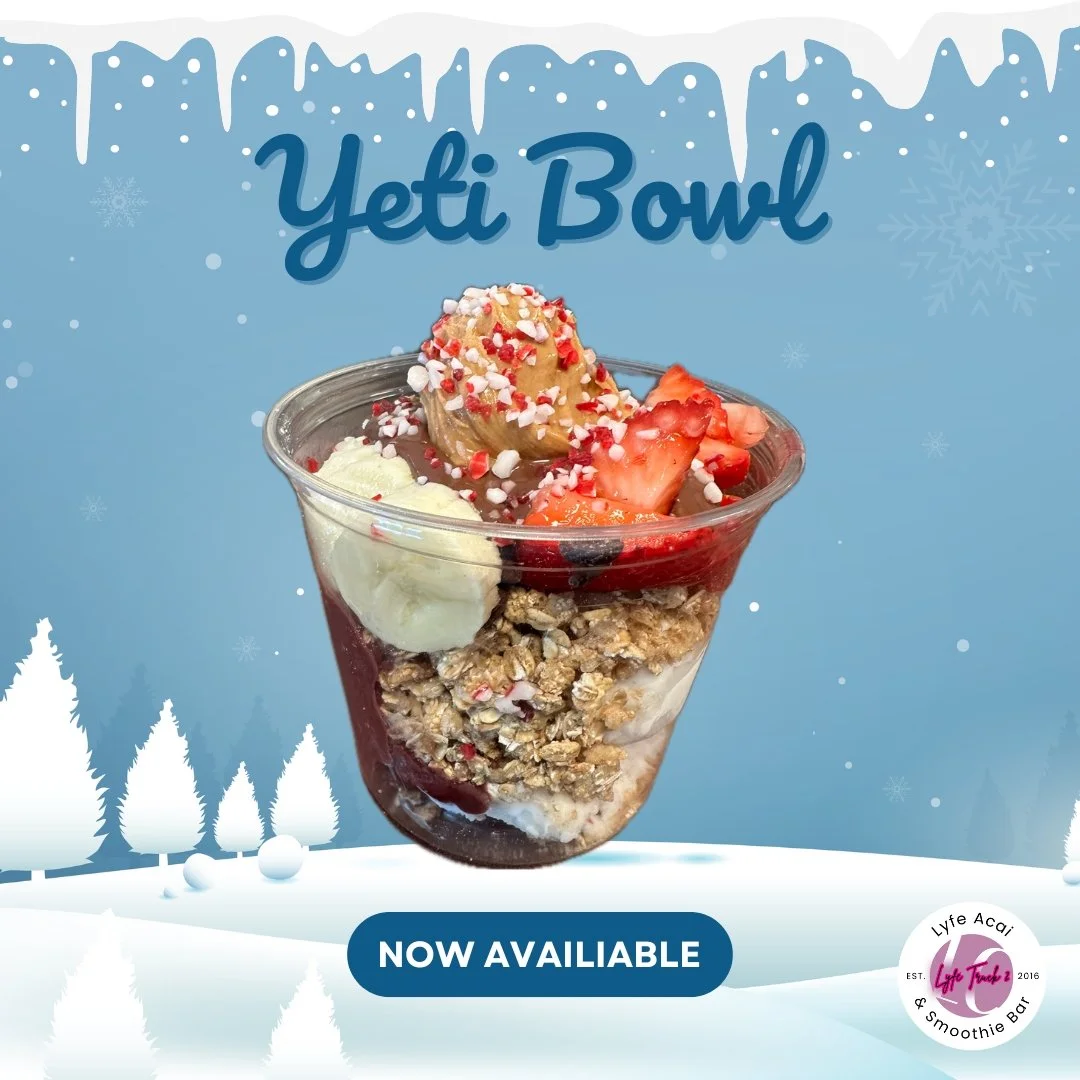 A dessert parfait in a clear cup with granola, strawberries, banana, and celebratory sprinkles, labeled as 'Yeti Bowl' on a blue winter-themed background.