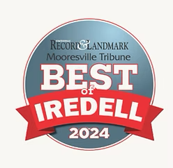 A circular award badge with text recognizing Iredell as the Best of 2024 in Mooresville Tribune and Record & Landmark newspapers.