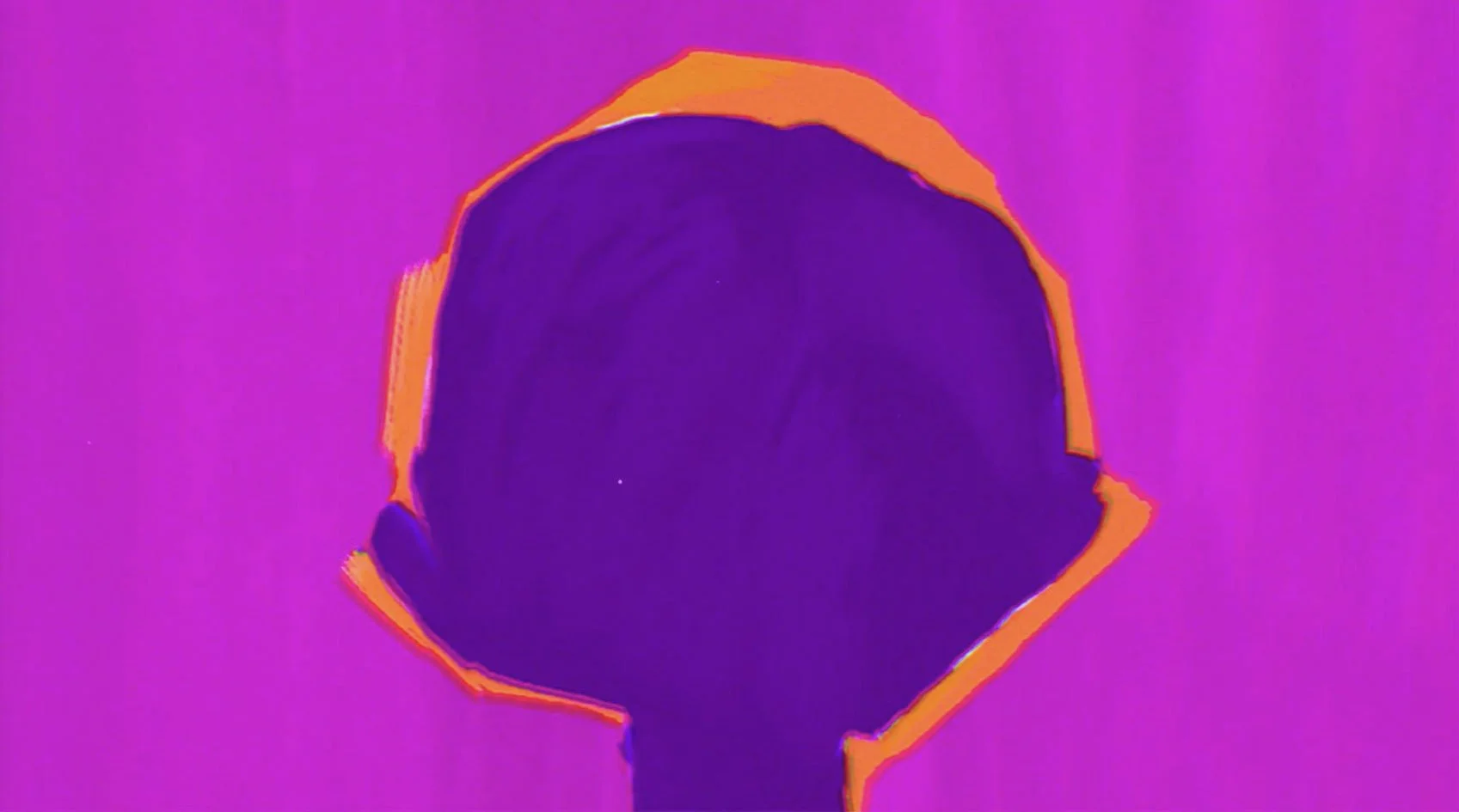 The back of young Mark Ronson's head, rimmed in orange light against purple — Watch the Sound, Apple TV+.