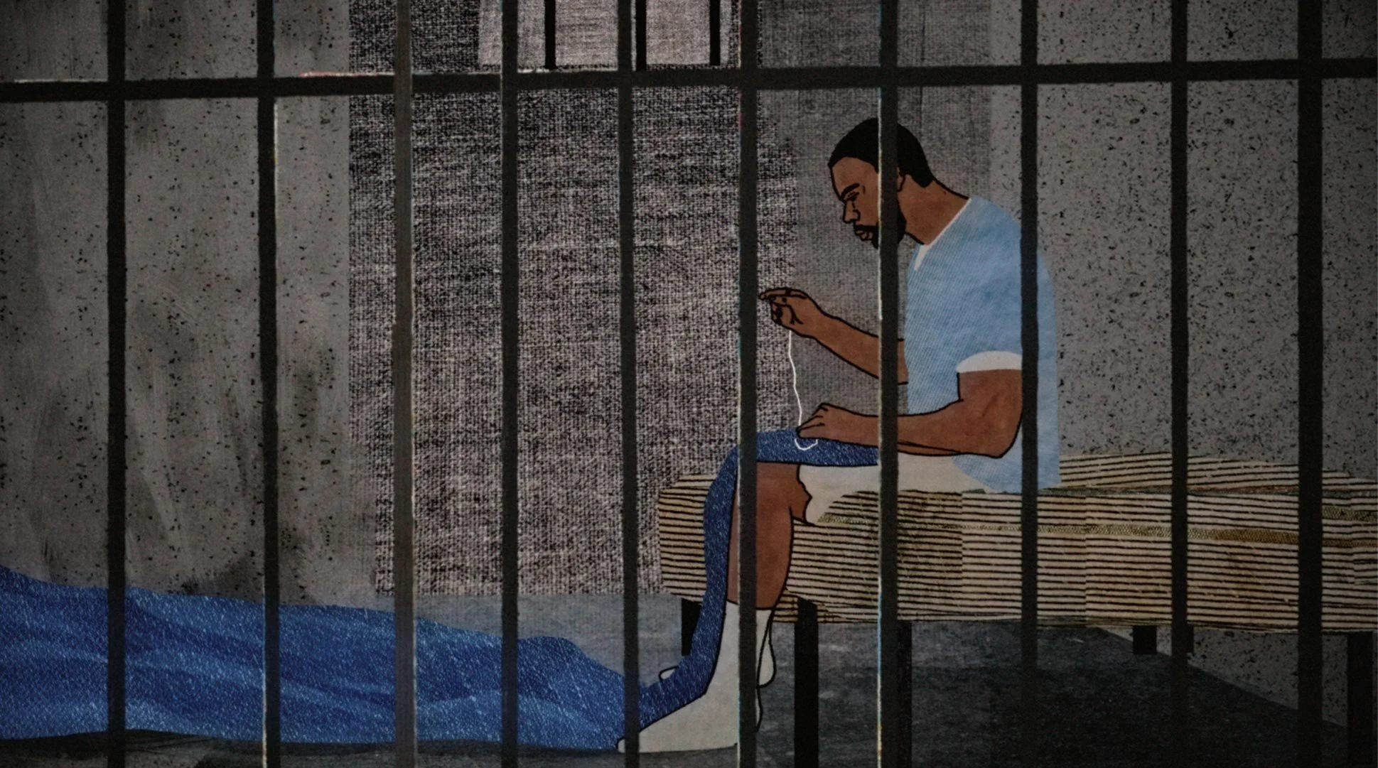 In his cell, Antwan bends over his work, learning to sew — Worn Stories, Netflix.