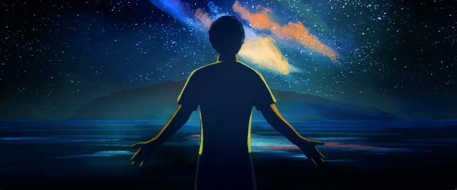 John Chau stands at the water's edge beneath the Milky Way, arms open, his outline lit gold — The Mission, National Geographic.