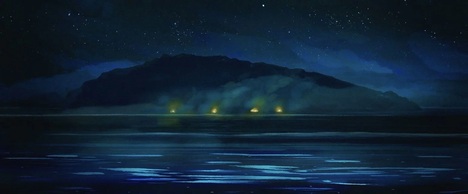 Small fires glow along the shore of North Sentinel island at night, reflected in the water — The Mission, National Geographic.