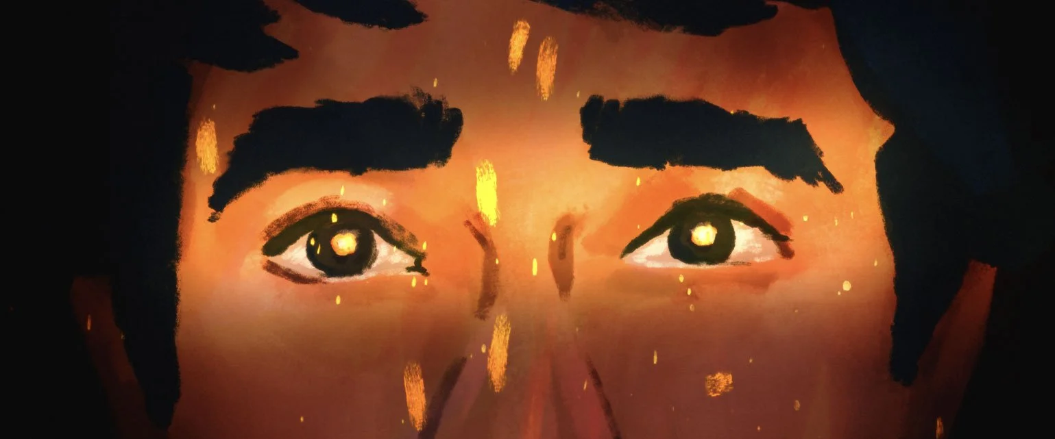 John's eyes glow in orange firelight as embers drift across his face — The Mission, National Geographic.