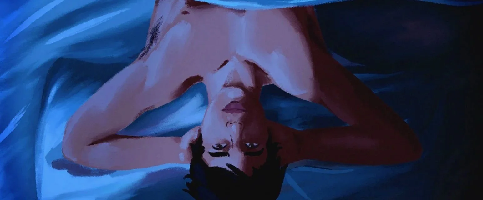John lies back with his head tipped upside down, his face lit in cool blue — The Mission, National Geographic.