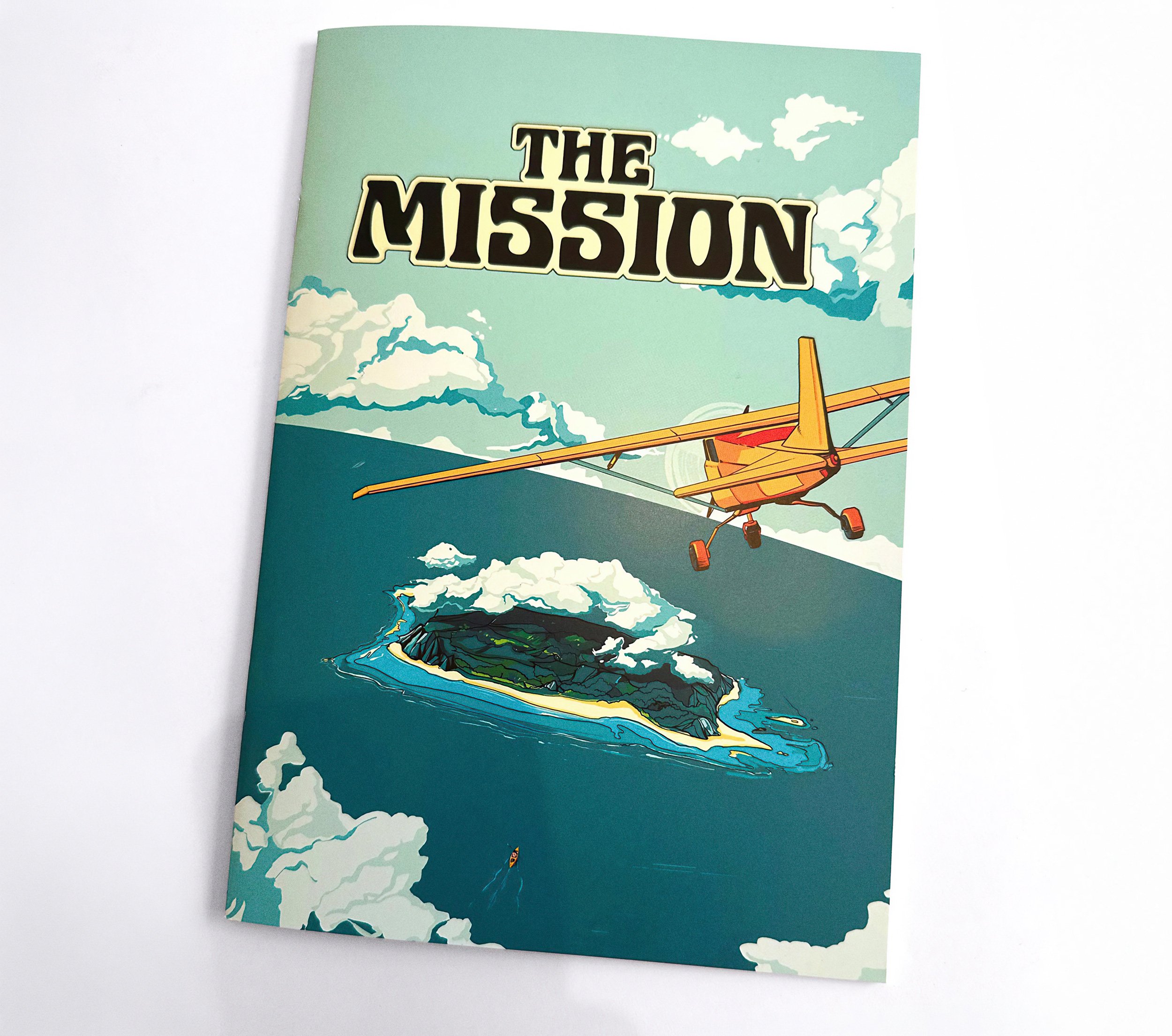 Comic book cover for The Mission: a small yellow plane flies over North Sentinel Island, ringed by surf and clouds, beneath the title in bold retro lettering — The Mission, National Geographic.