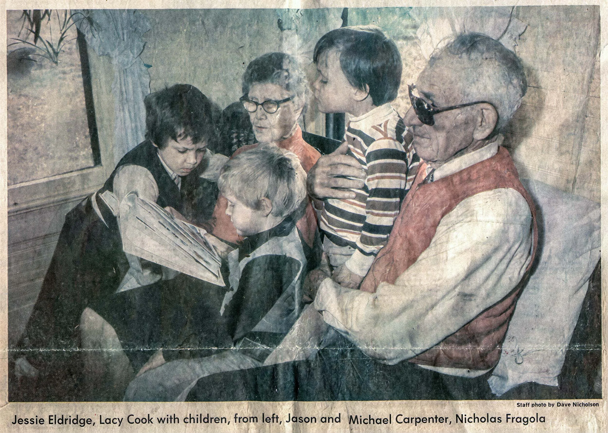 Greensboro News & Record clipping, 1980: Jessie Eldridge and Lacy Cook read a picture book with three boys, from left Jason Carpenter, his brother Michael and Nicholas Fragola — The Renter.
