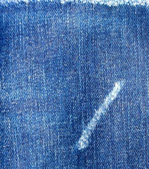 Fabric: dark blue denim with a pale worn scuff — Worn Stories, Netflix.