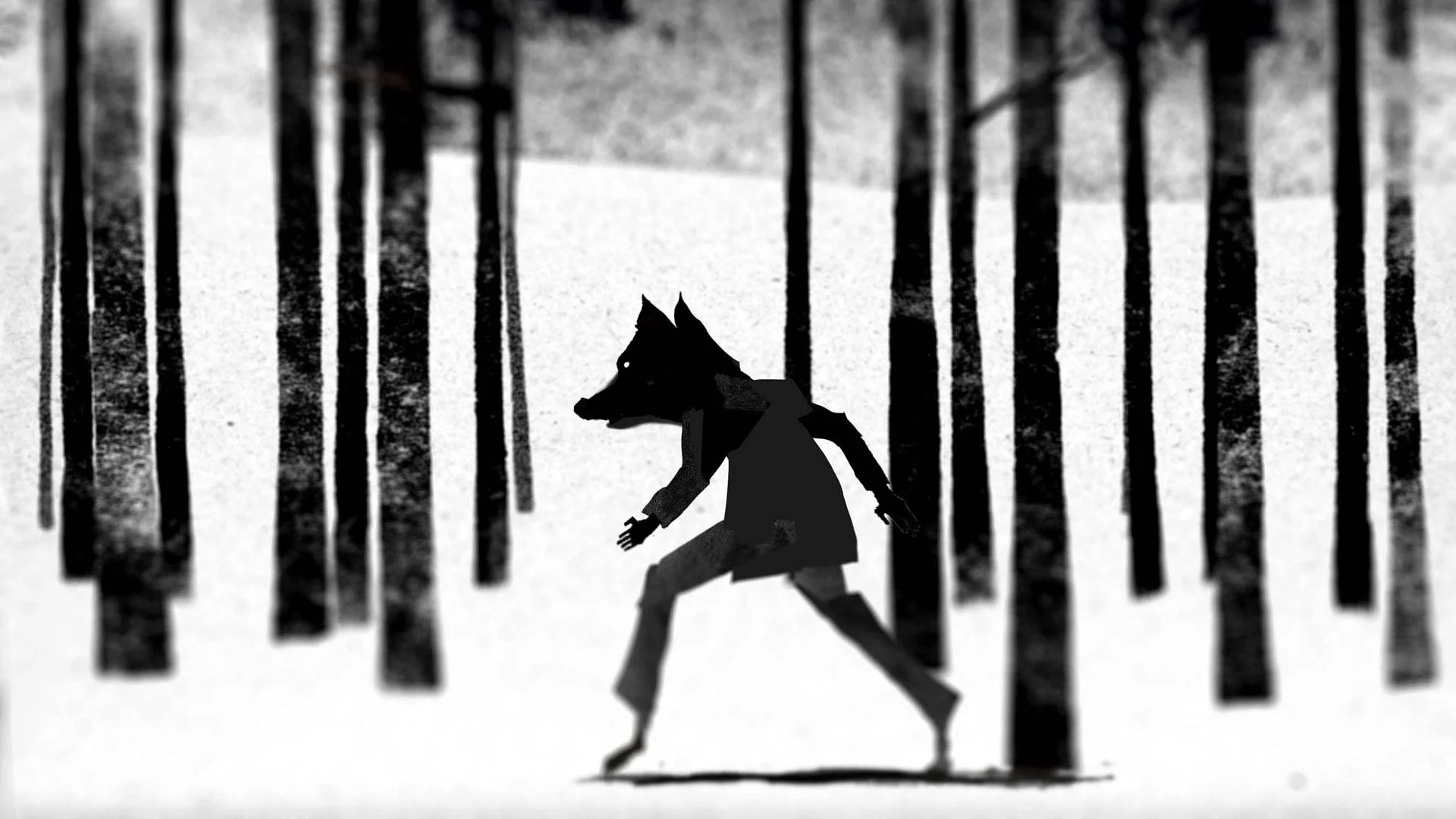 A dog-headed figure in a coat strides through the snowy woods — Between Dogs & Wolves, Wiener Staatsballett.