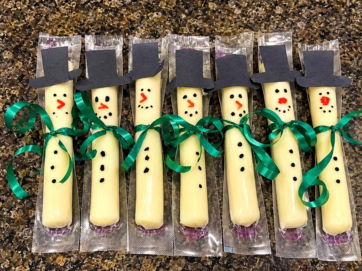 Snowmen snacks for children's party. String cheese bought in bulk.