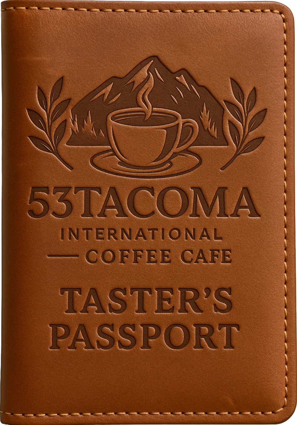 Leather coffee shop passport with embossed text and mountain with coffee cup logo