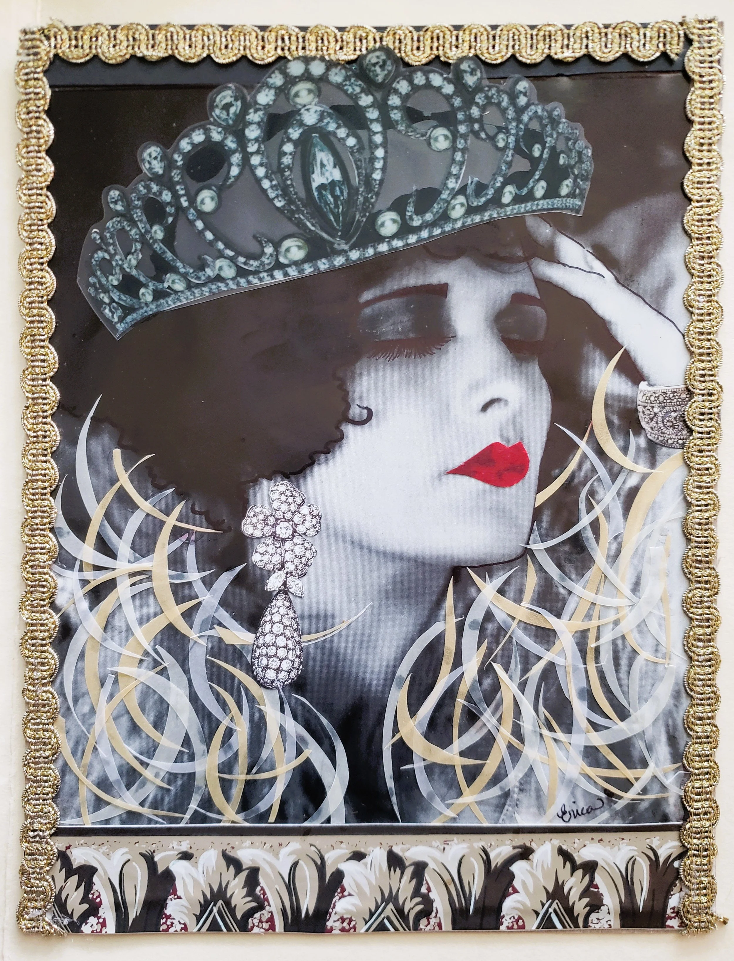 Decorative artwork featuring a black and white portrait of a woman with red lipstick, a crystal tiara, elaborate jewelry, and surrounded by swirling patterns, framed with an ornate gold border.