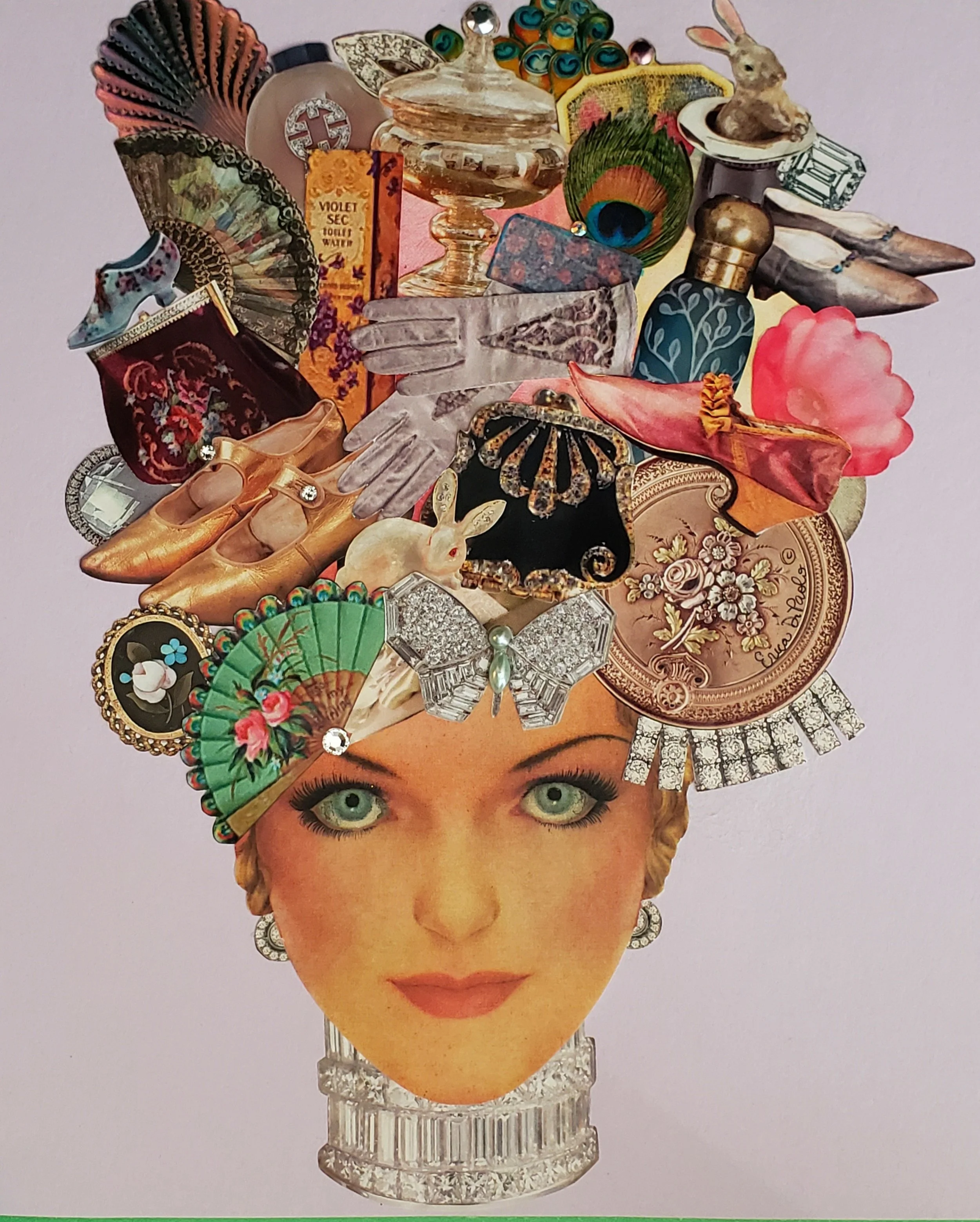 A collage image of a woman's face with various decorative and vintage items arranged on her head, resembling a creative headdress. The items include jewelry, peacock feathers, a rabbit figurine, a perfume bottle, lace gloves, a fan, and other ornamental objects.