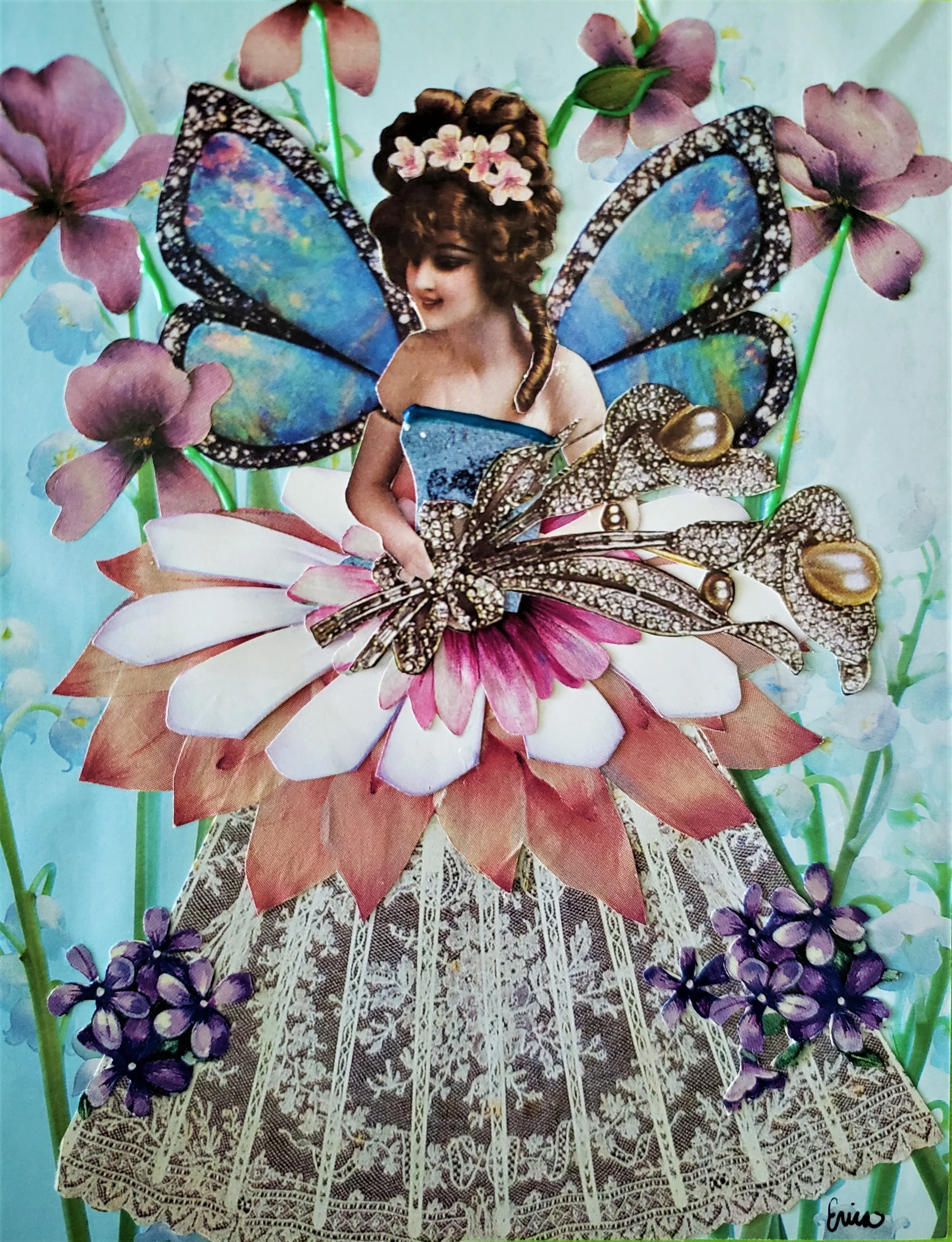 A collage featuring a fairy with brown curly hair adorned with pink flowers, blue butterfly wings with black and white borders, a lace dress, and surrounded by purple flowers. The background is pastel blue.