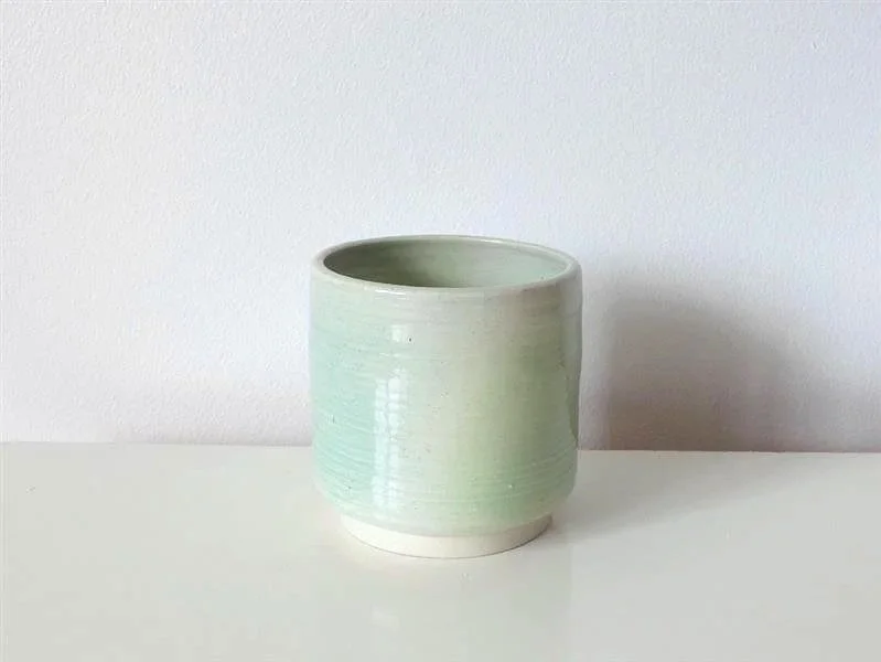 Green airbrushed coffee cup