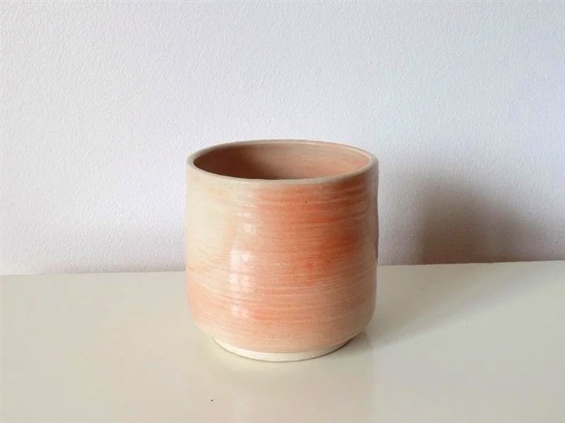Orange airbrushed coffee cup
