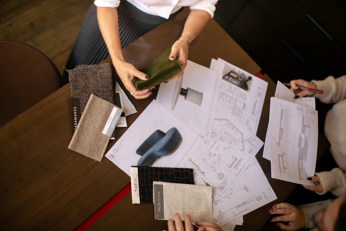 The reveal gets the applause. This is where the work actually happens.⁠
⁠
Swatches on every surface. Six opinions about one fabric. At least one debate that ends with "fine, you were right."⁠
⁠
Twenty-five years in, this table is still my f