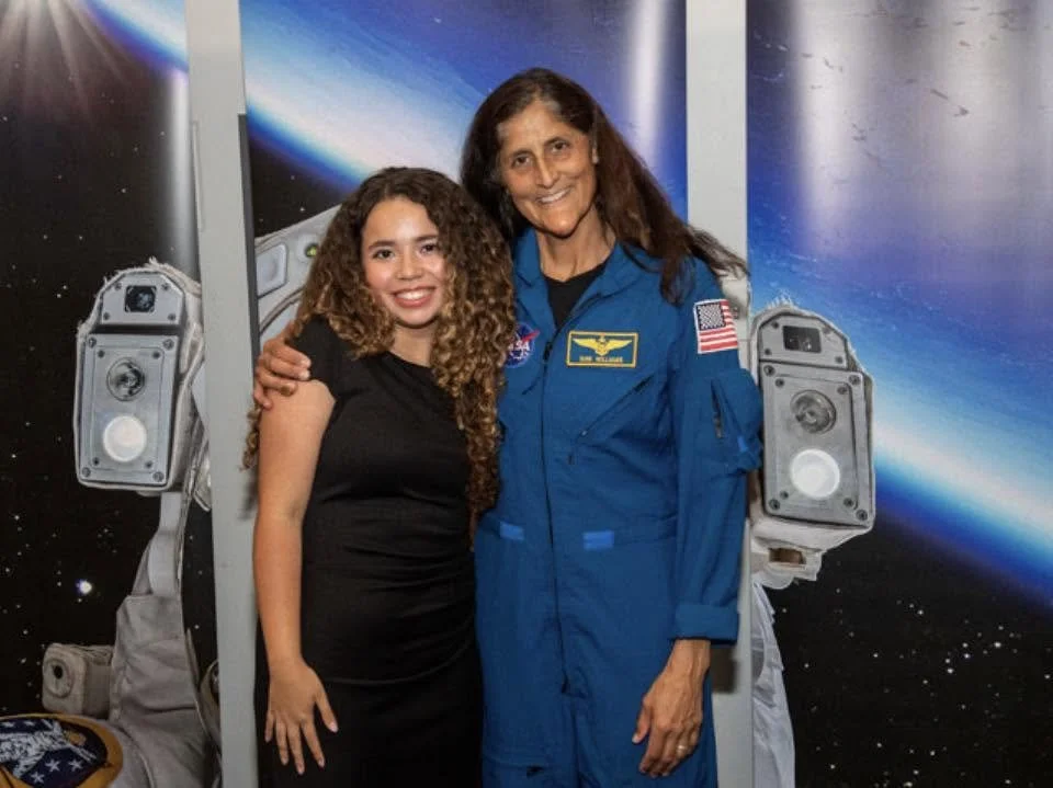 Razi Montalto singing national anthem at NASA ceremony with NASA astronaut Sunita Suni Williams coloratura soprano vocalist