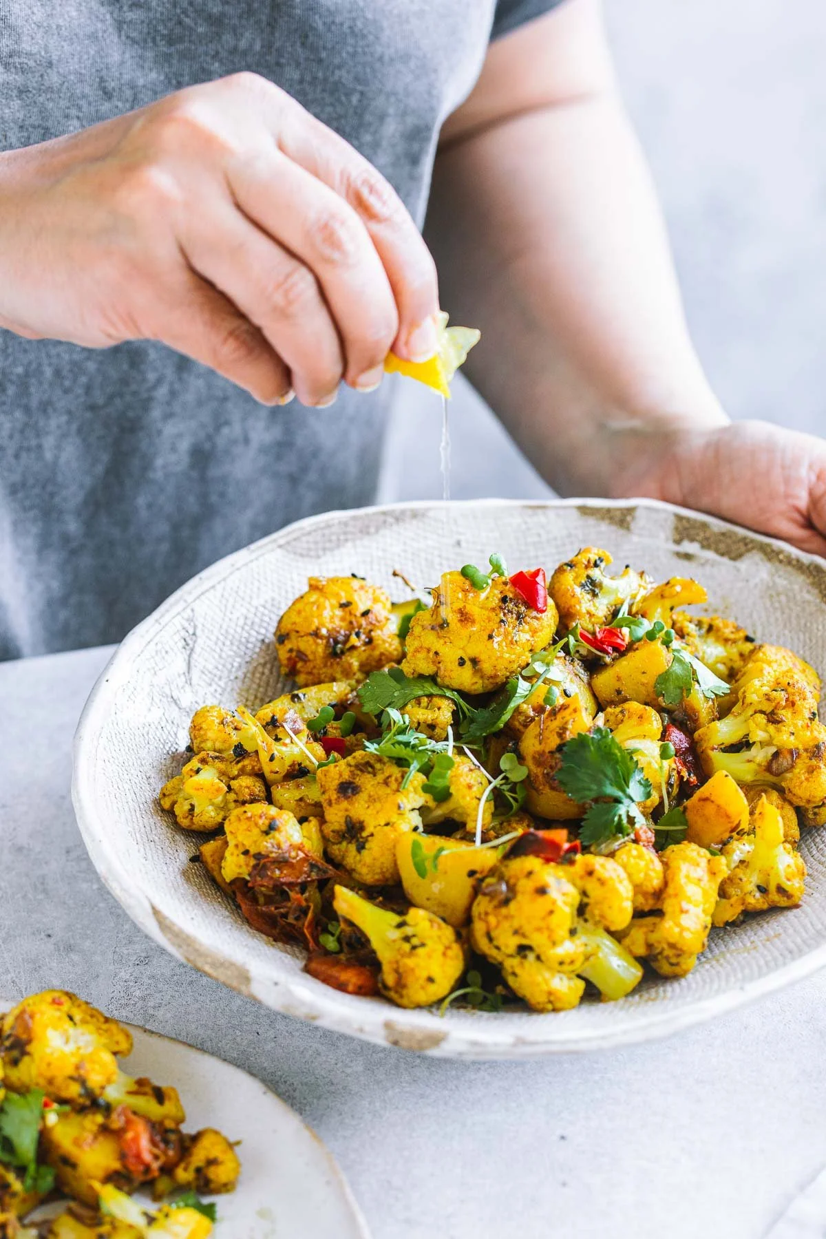 aloo-gobi-served-lemon-wedge.jpg