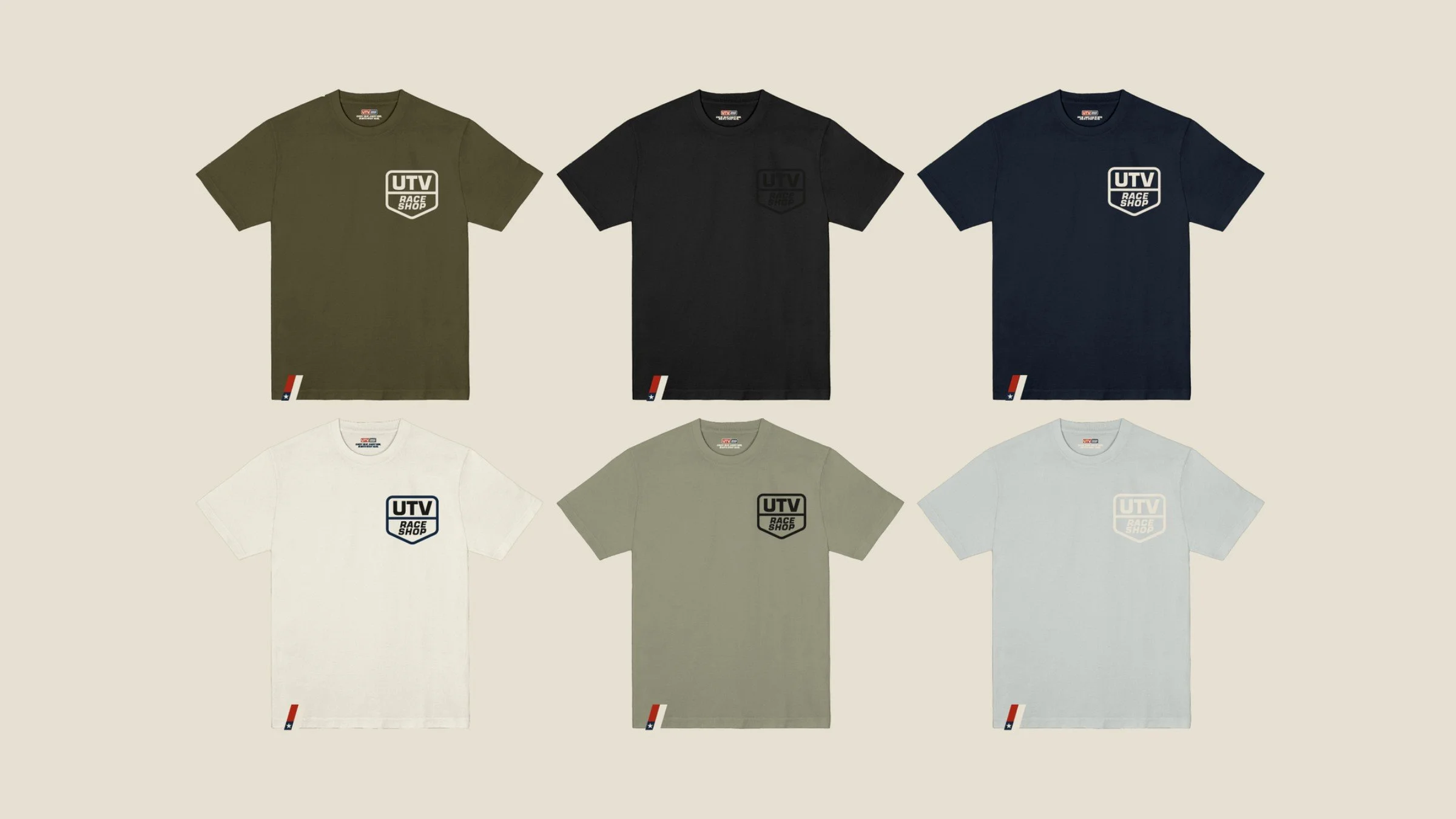 Tonal capsule: six tees in olive, black, navy, white, sage and ice blue with the shield logo in matching tones.