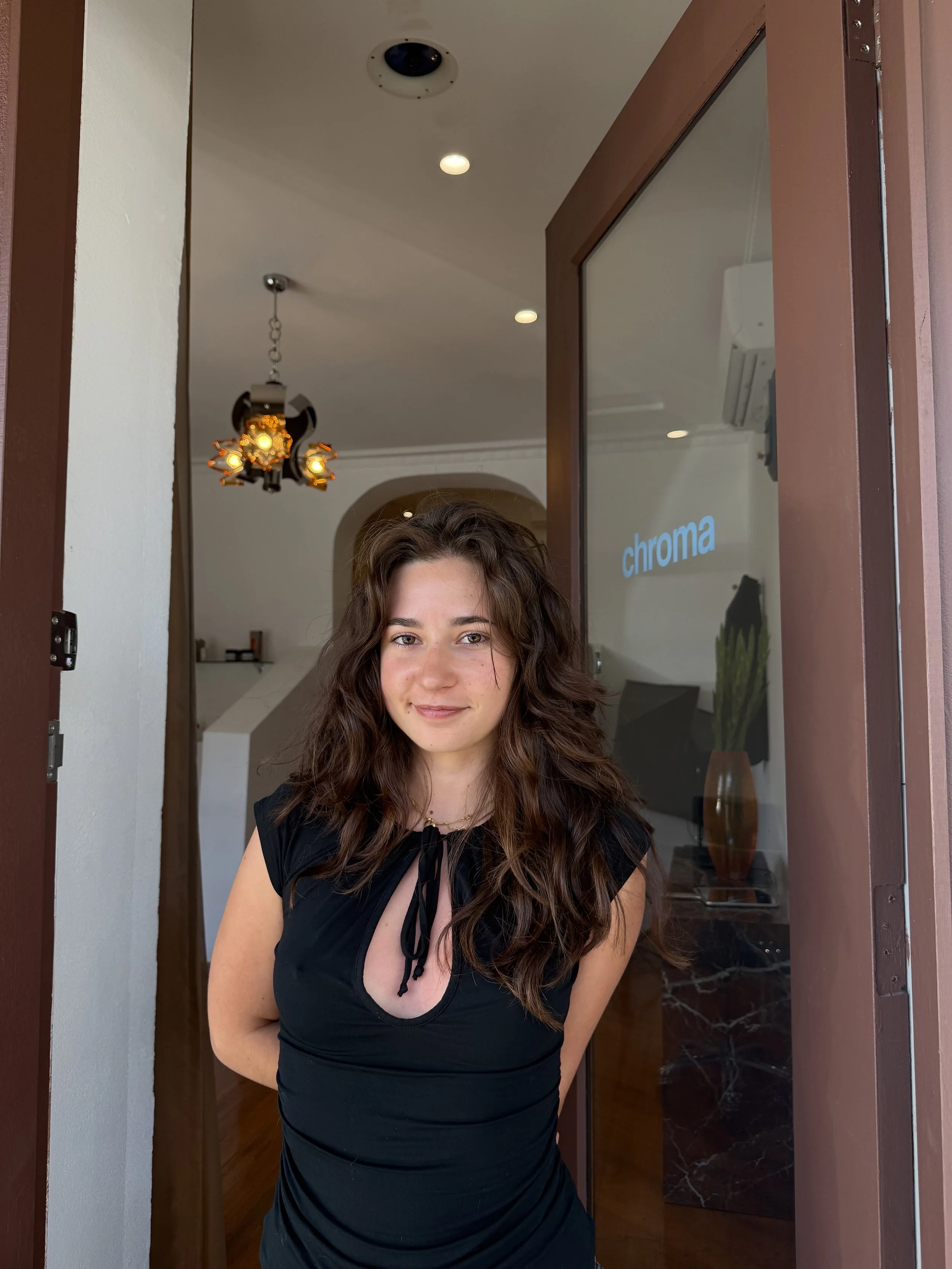 Hairdresser in doorway