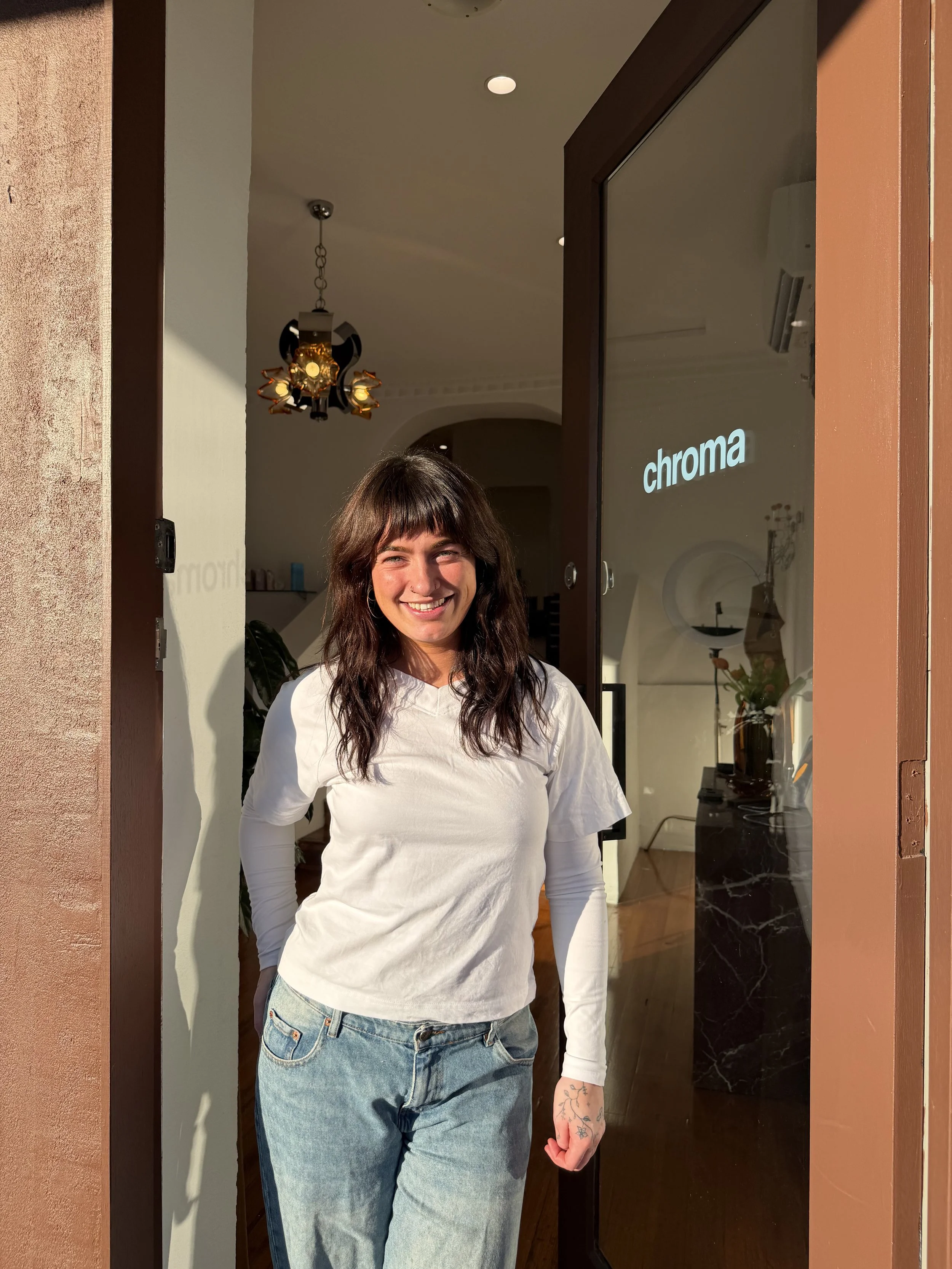 Hairdresser out front of chroma hair