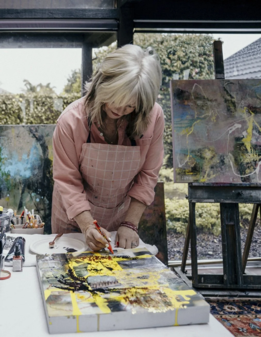 Jackie Steyn mixed media artist from Matamata, NZ painting.