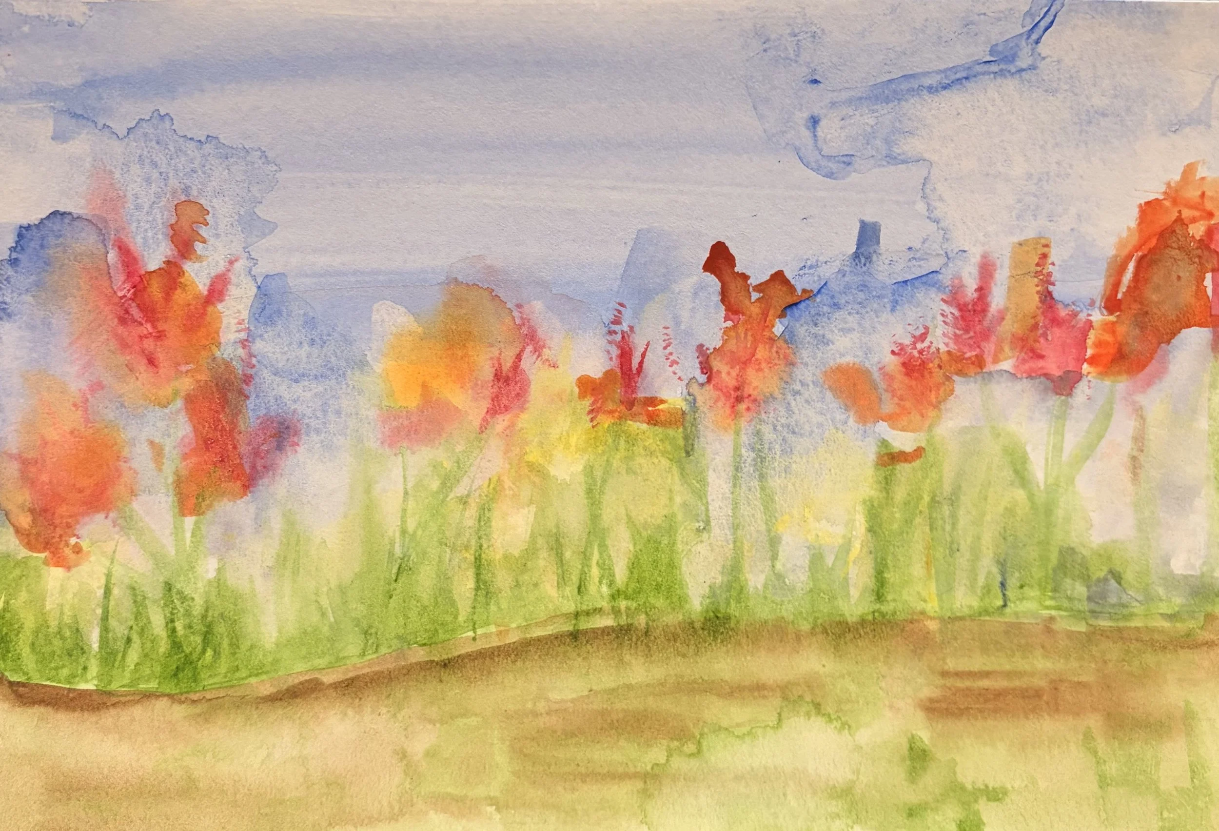 A watercolor painting of a colorful field of flowers with a pale sky in the background.