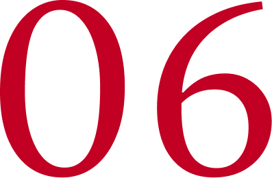 Close-up of the number six in red font.
