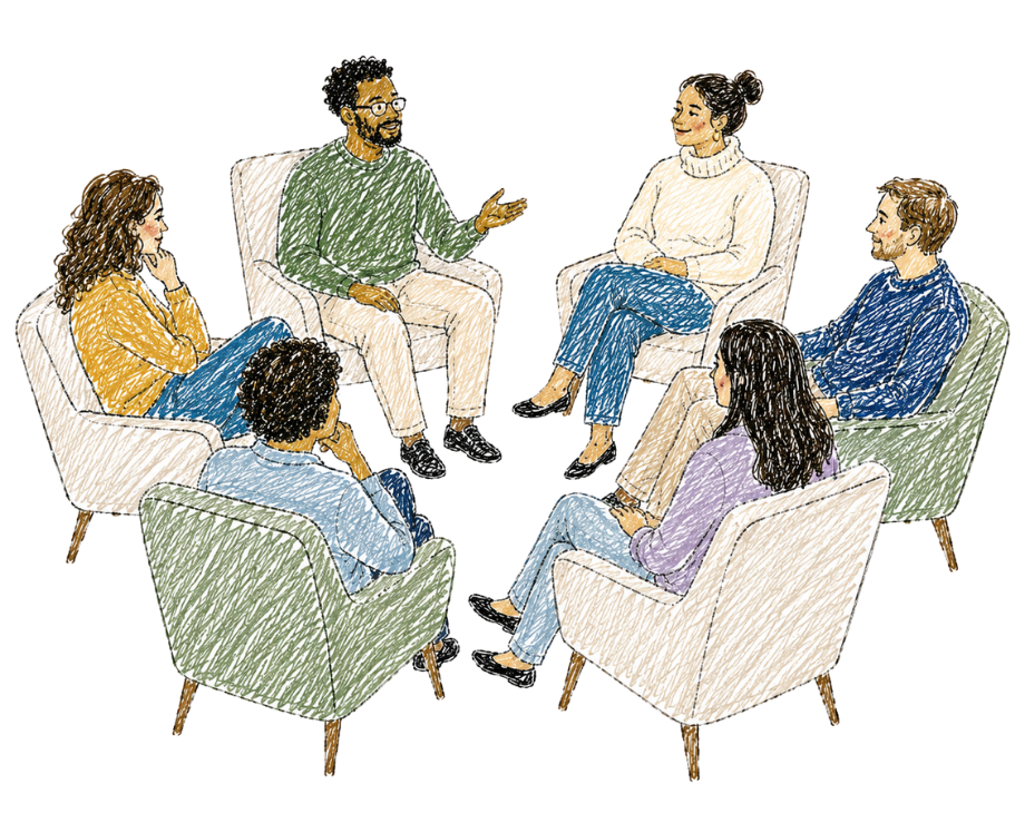 A diverse group of six people participating in a discussion in a circle of chairs, with one person speaking and others listening attentively.