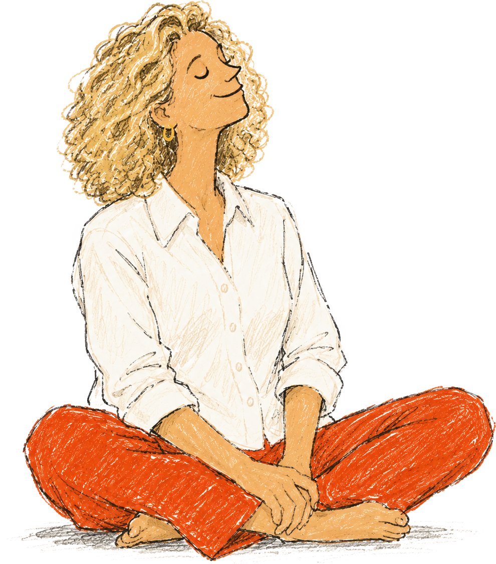 A woman with curly blonde hair sitting cross-legged with her eyes closed and a peaceful expression, wearing an off-white shirt and orange pants.