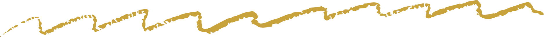 Close-up of a gold-colored zentangle pattern on a black background.