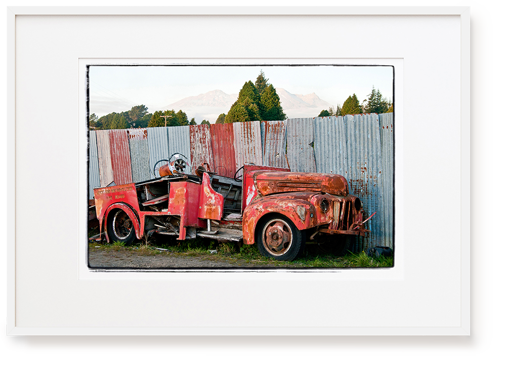 Photograph by Erica Leather of old rusty fire engine at Smash Palace