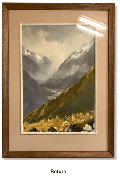 Painting of a mountain landscape with river valleys and snow-capped peaks, framed in wood.