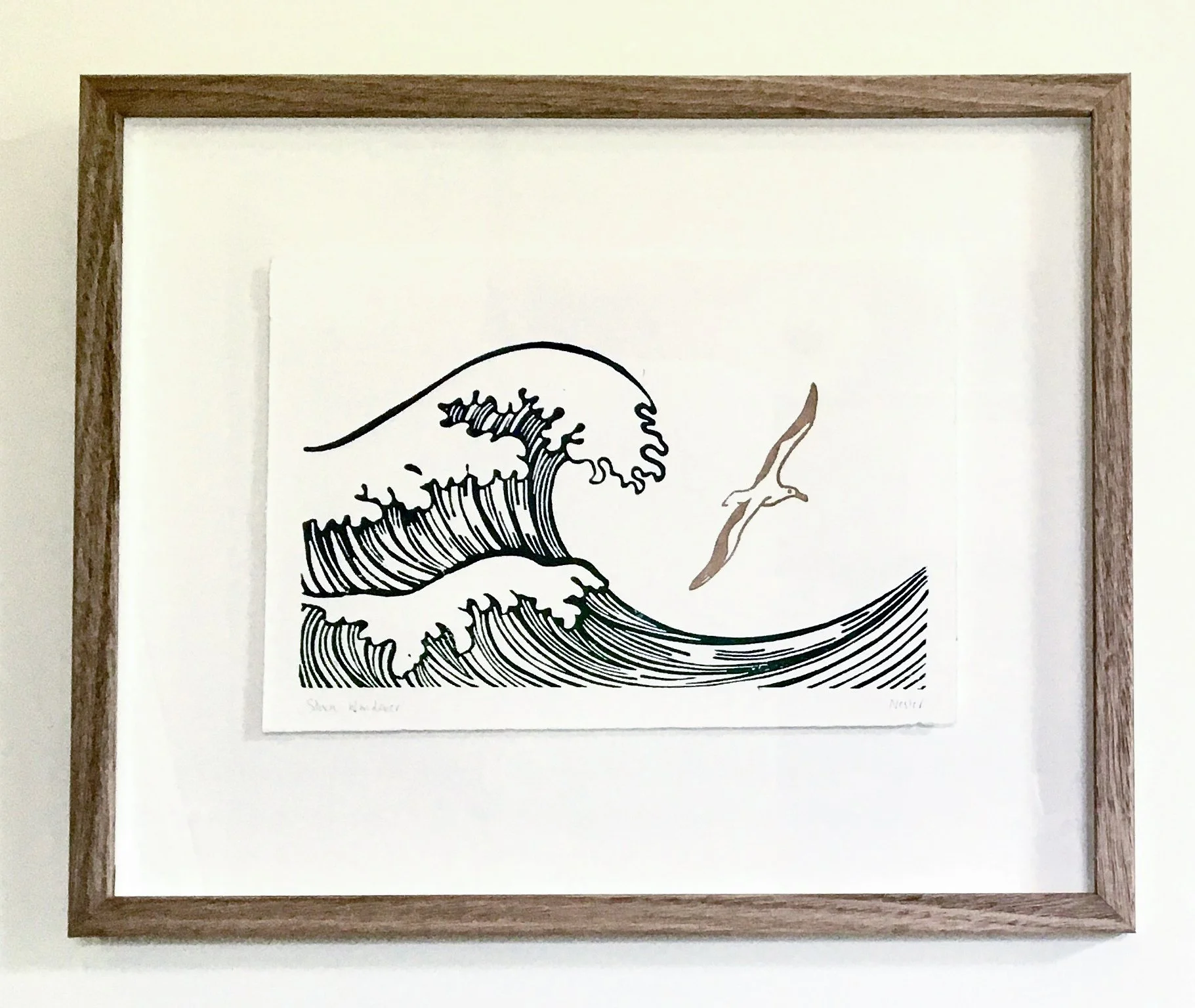 Original lino print by Esther Remnant, float framed with a white background and a wooden frame. 