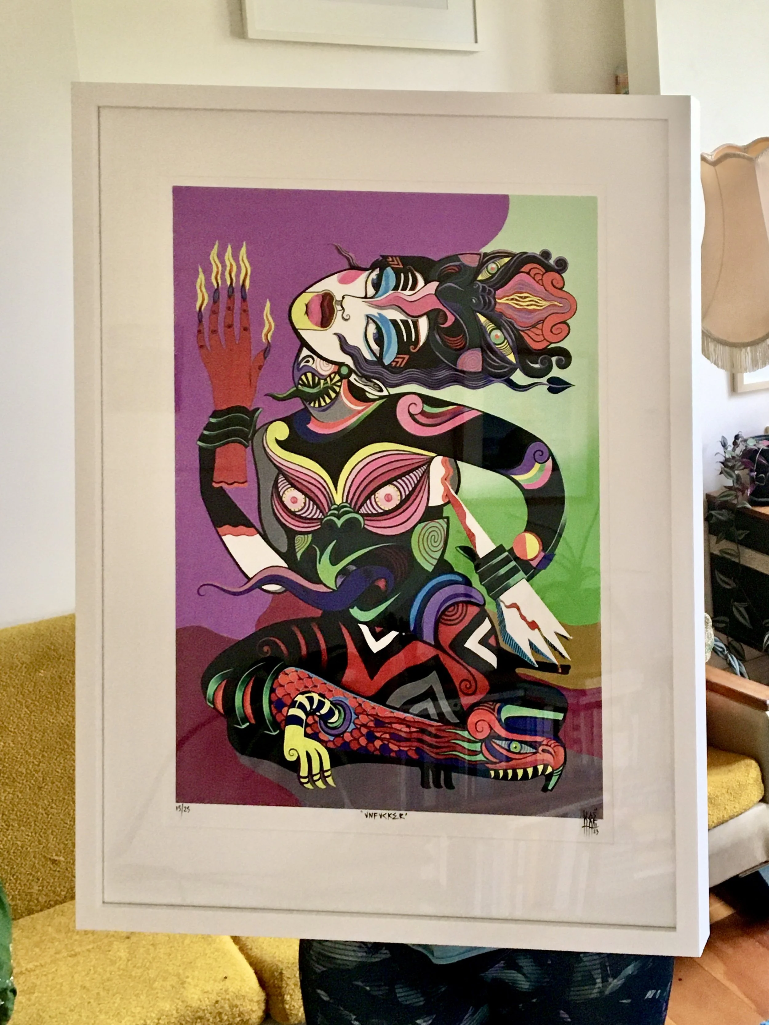 Colorful abstract painting of a woman with long wavy hair, featuring vibrant colors and intricate patterns. This is a framed fine art print titled "UNFUCKER" by Wellington-based New Zealand artist Xoë Hall.