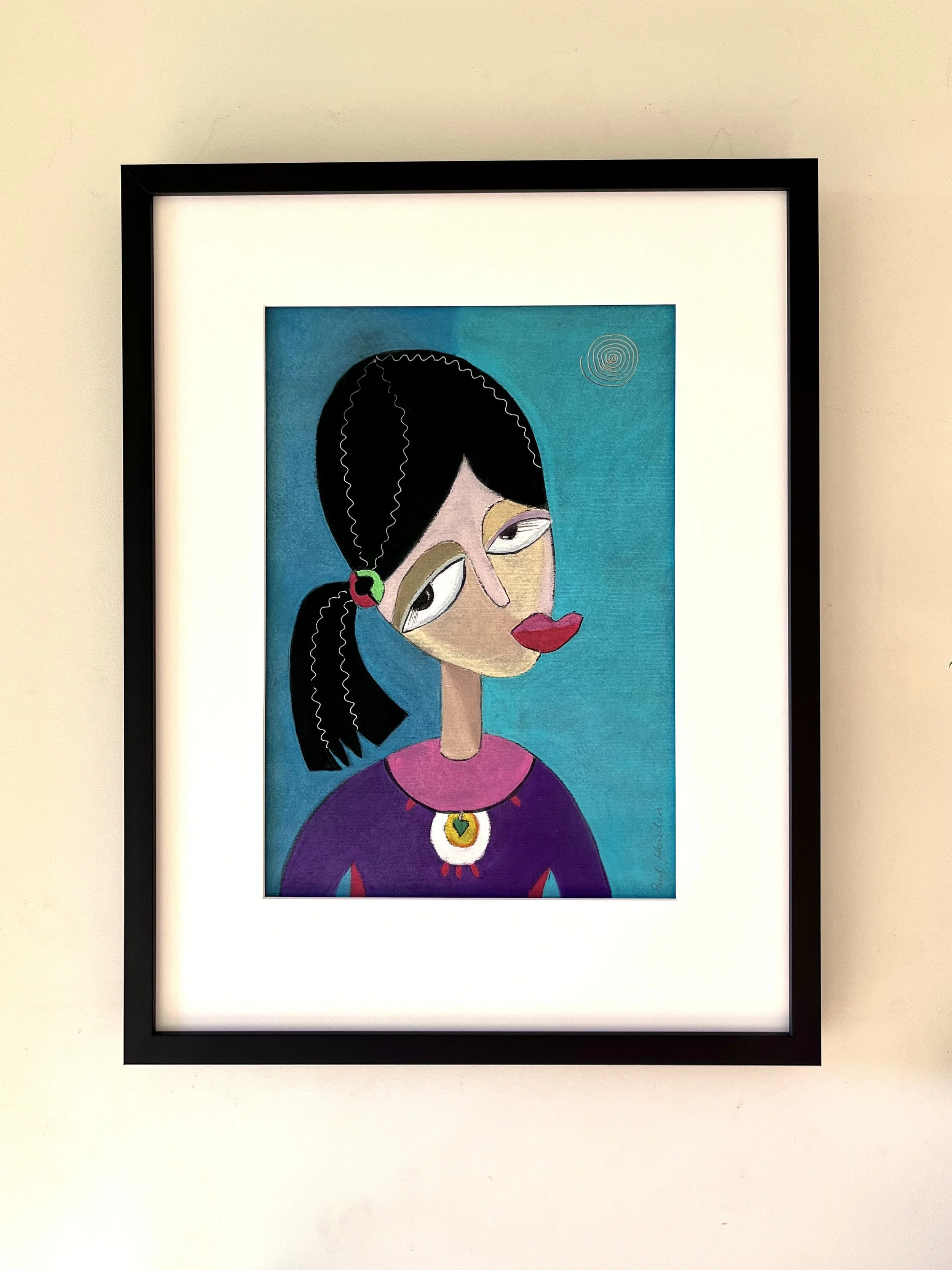 A framed pastel drawing of a stylized woman with black wavy hair, large eyes, and red lips, wearing colorful earrings and a purple top with a heart-shaped necklace against a blue background with a small swirl design. By Paul Howden