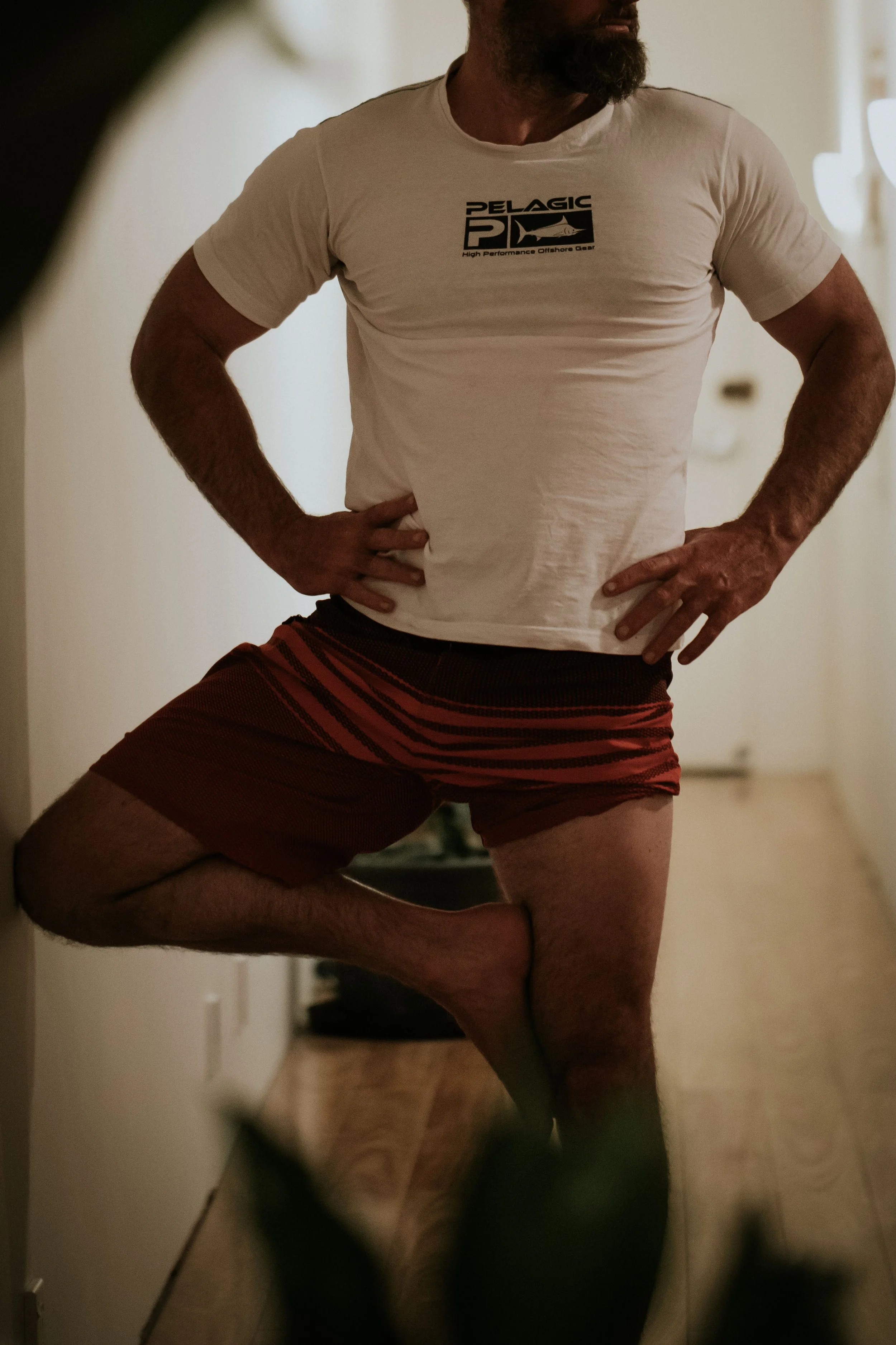 Man practising yoga during a Broga class at Yoga Whitianga