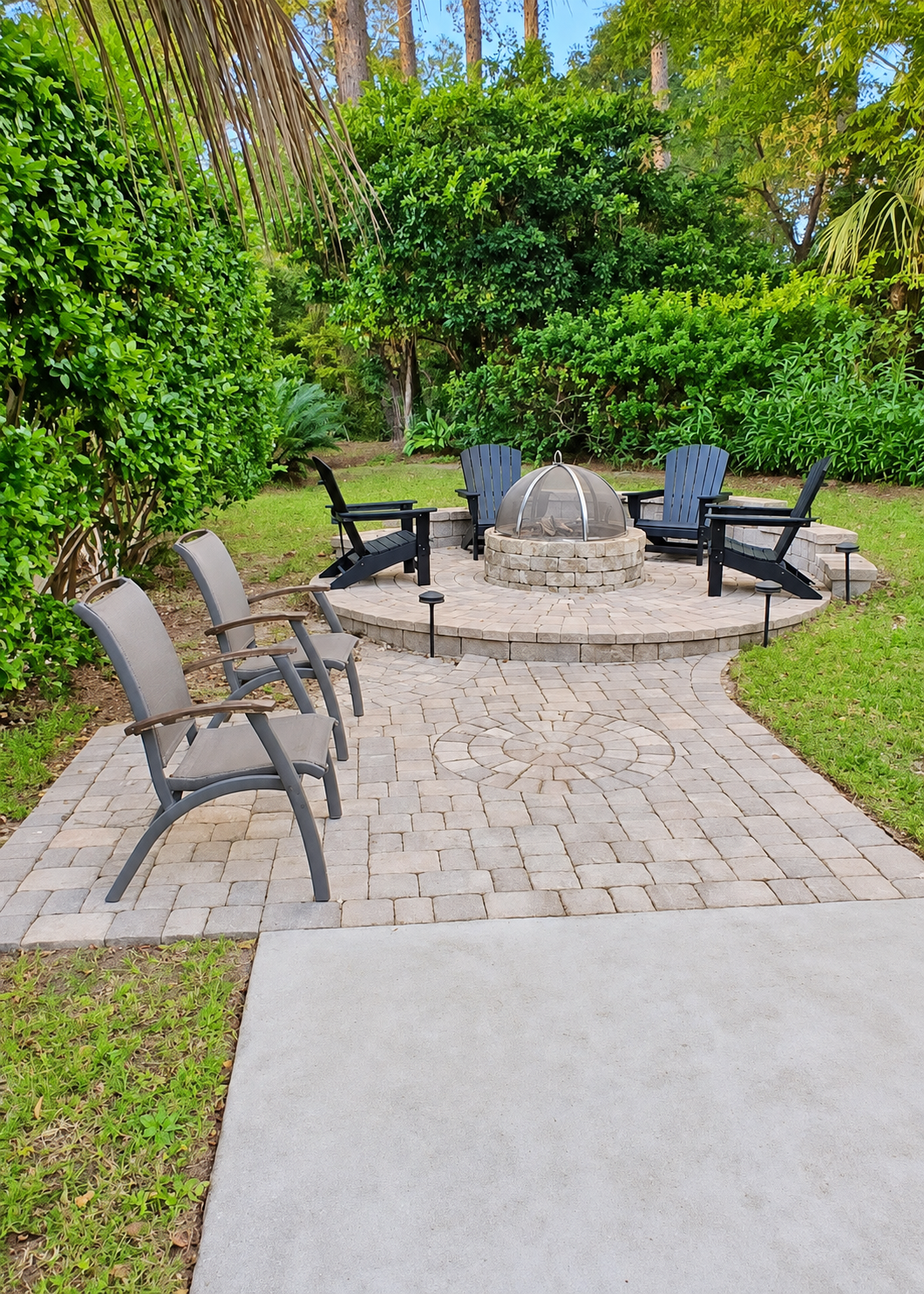 Bright Backyard Fire Pit Patio.png