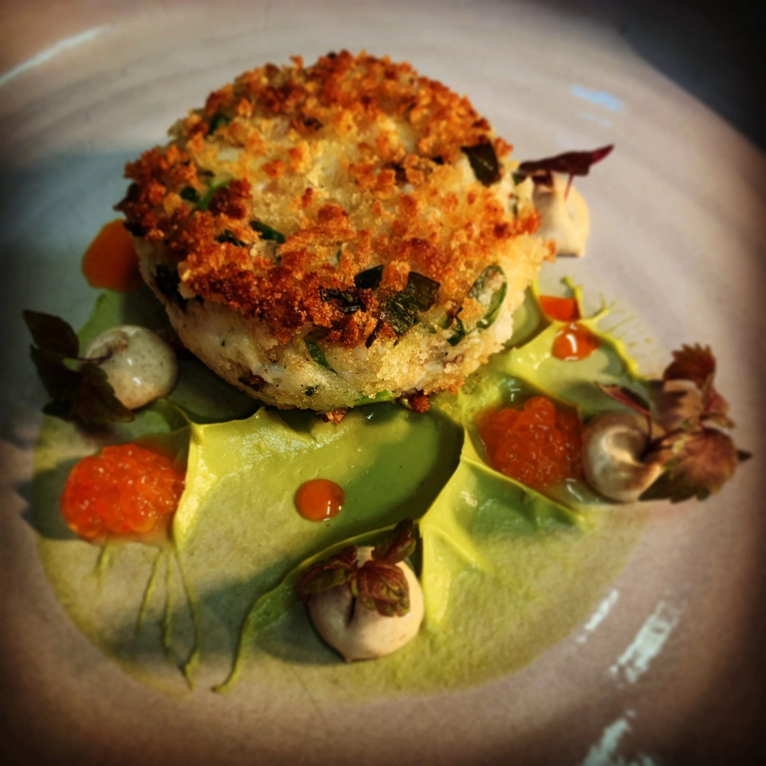 Crispy crab cake on wasabi mousse, keta caviar, nori dip and micro herbs.
