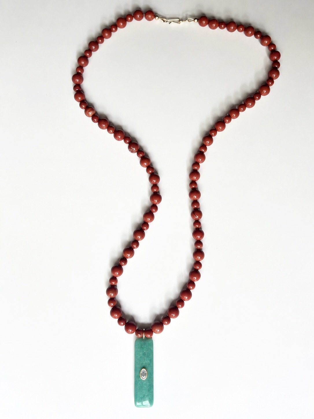 -Red Jasper beaded necklace with an Amazonite pendant. 
-Generous 26 inch length excluding pendant. Enough to wear alone or perfect for layering.
-Finished with a gold filled clasp, much more hard wearing than gold plated ✨
-Available now via DM or o
