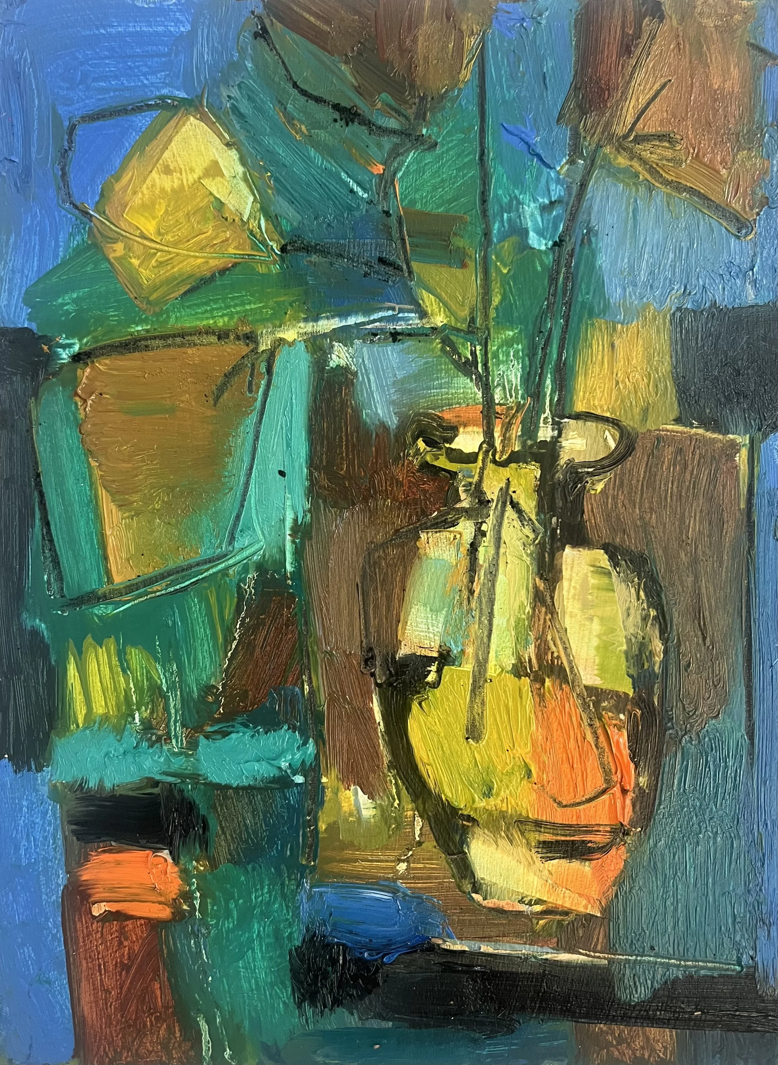 Glass vase on blue