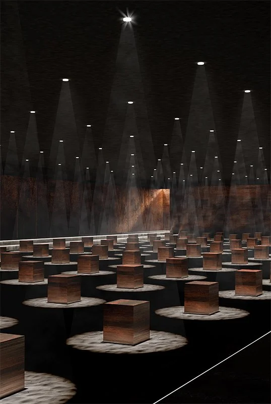 An art installation with multiple wooden blocks placed on circular platforms inside a dark room illuminated by spotlights from above. A memorial.