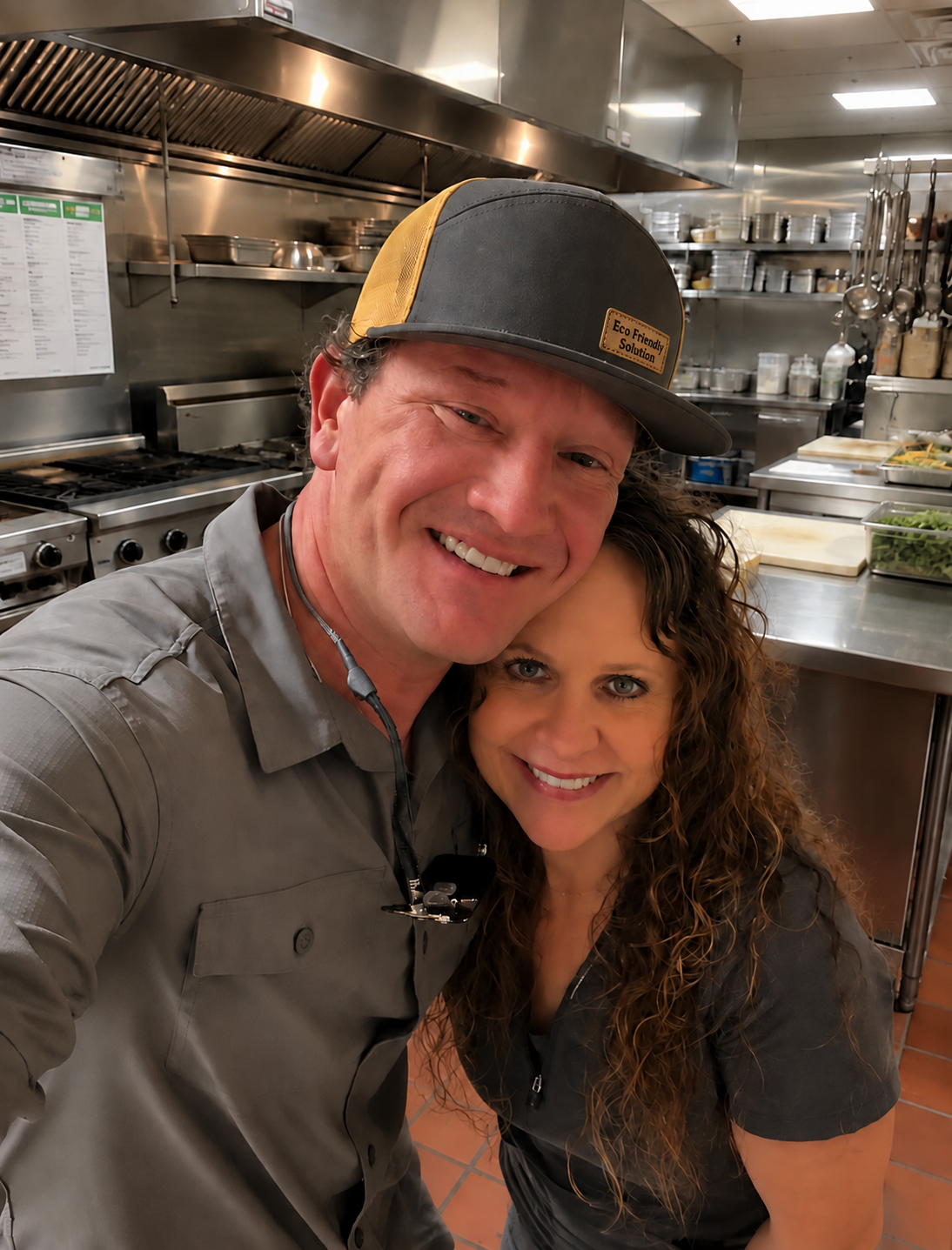 Owners of Eco Friendly Solutions in a commercial restaurant kitchen