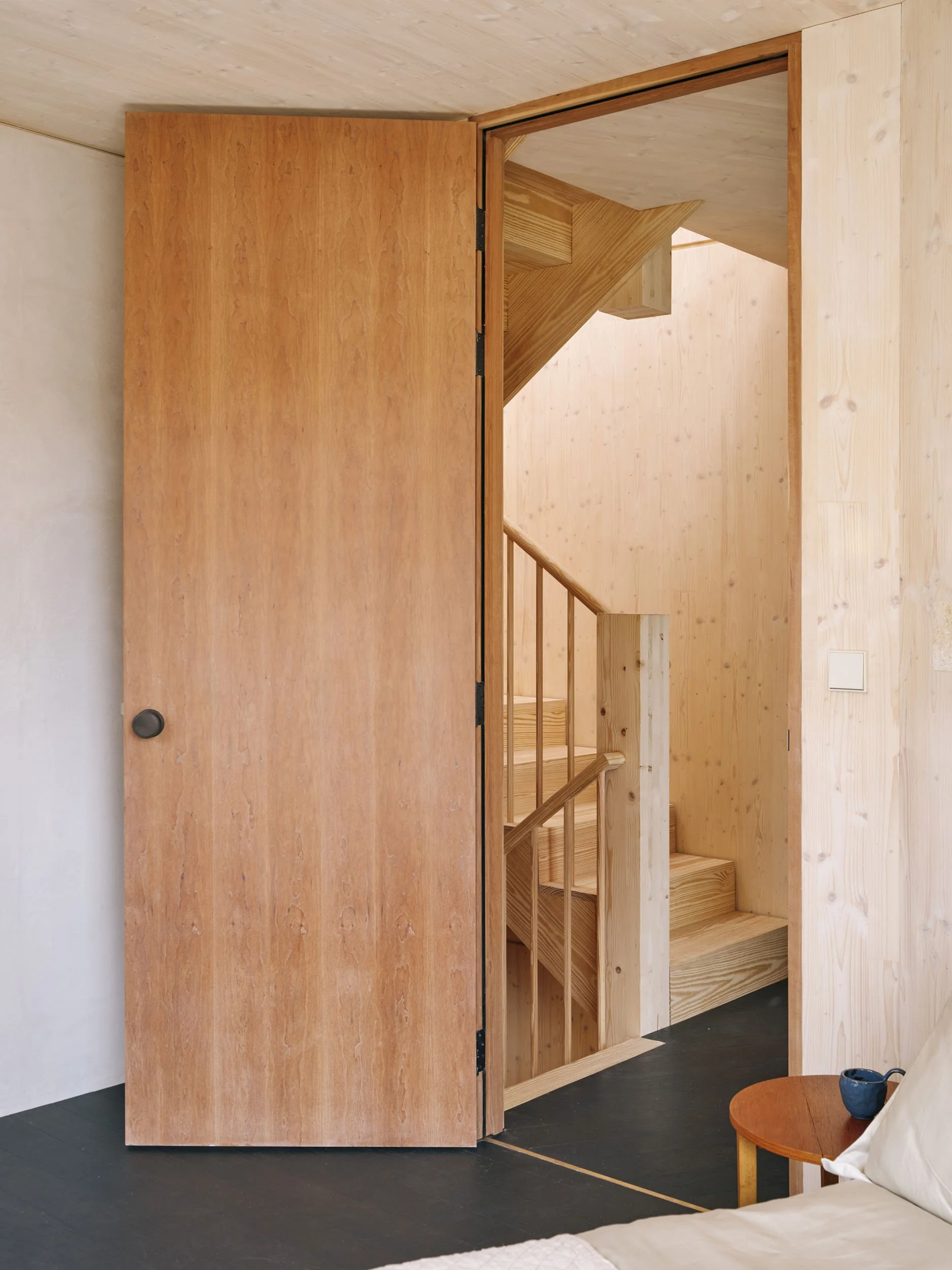 Timber door opening onto the stair